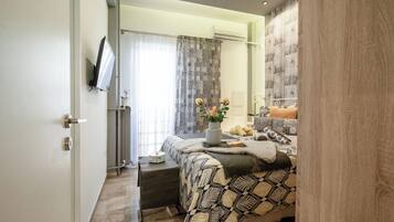 1 slaapkamer, een bureau, een strijkplank/strijkijzer, gratis wifi