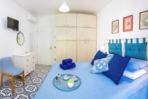 2 habitaciones, tabla de planchar con plancha, wifi y ropa de cama 