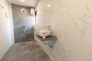 Deluxe Room | Bathroom | Shower, towels, soap, toilet paper - MJ Resort (Panvel)