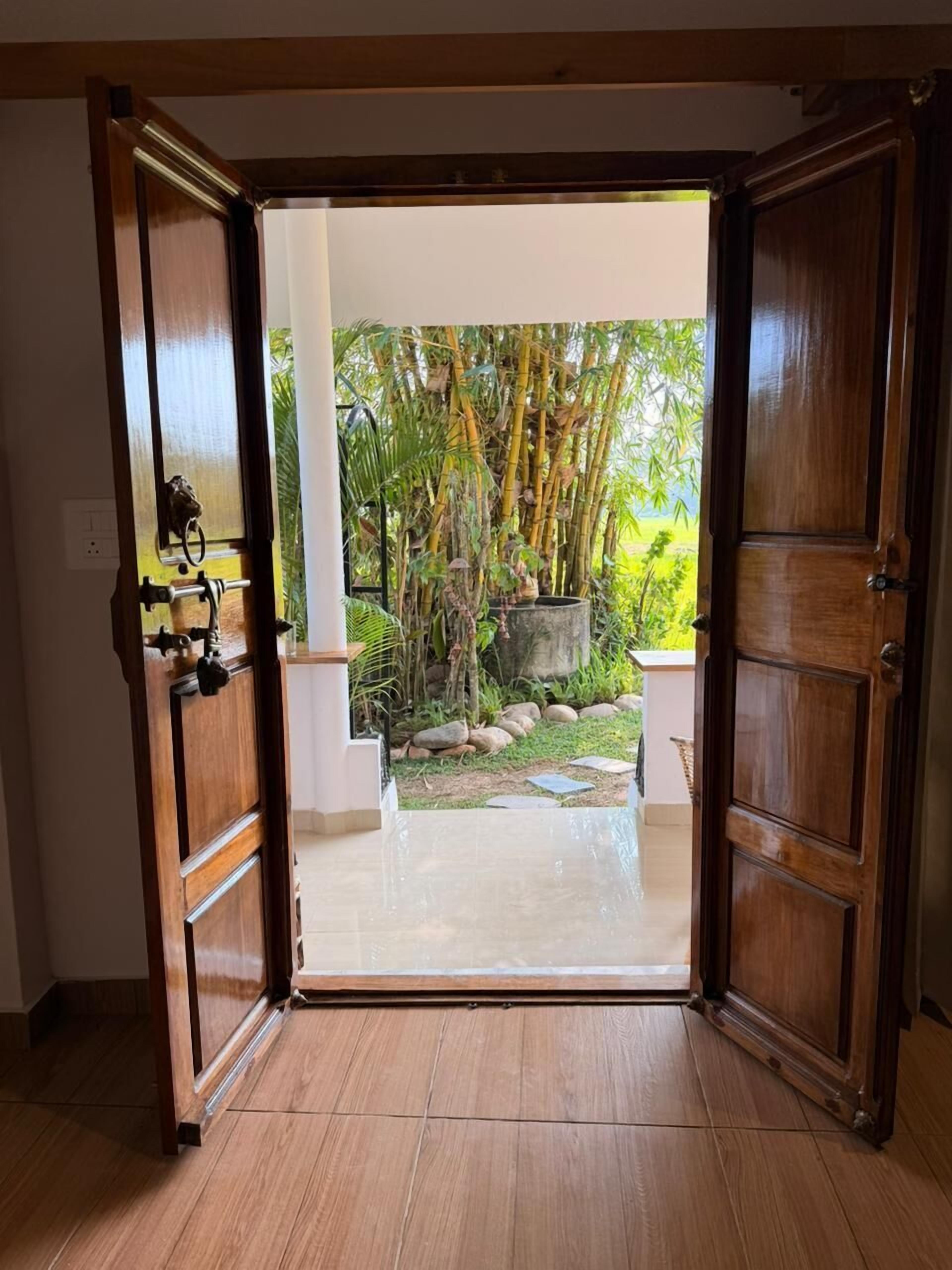 Executive Double Room, Patio, Garden View | Laptop workspace, iron/ironing board