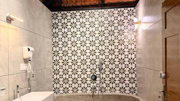 Luxury Double Room, Bathtub, Garden View | Bathroom | Hair dryer, towels, soap, toilet paper