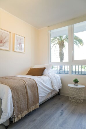 2 dormitorios, tabla de planchar con plancha, wifi gratis y ropa de cama