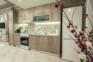 Fridge, microwave, oven, stovetop - The Ivory - Luxury Apartment in Egaleo/Athens (Egaleo)