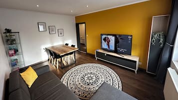 Comfort Apartment, Garden View | Living area