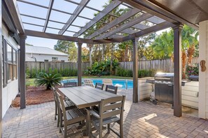 Outdoor dining - PRIVATE POOL! Rare Resort Beach House! 6-Seat Golf Cart, Fenced Yard & Games! (Miramar Beach)