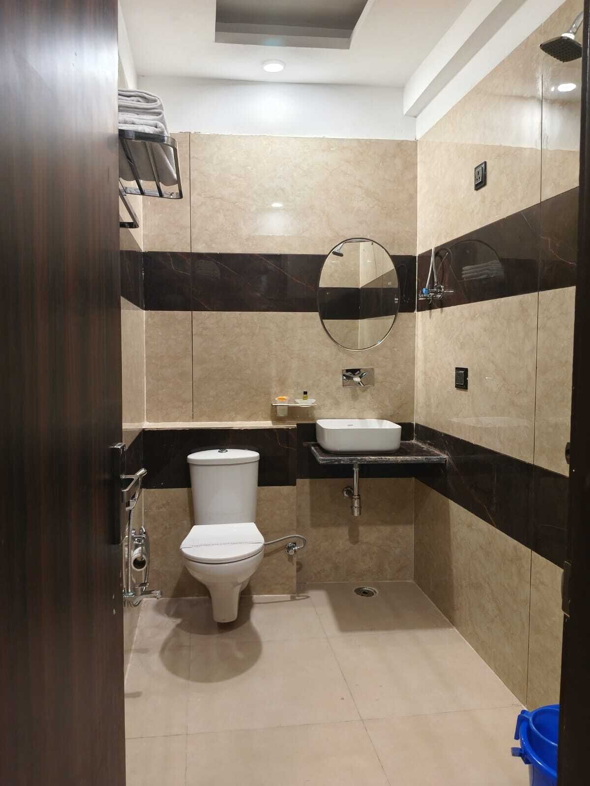 Family Room, 2 Double Beds | Bathroom | Shower, free toiletries, towels, soap