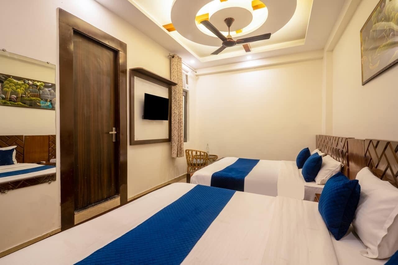 Basic Quadruple Room, 2 Double Beds | Free WiFi, bed sheets