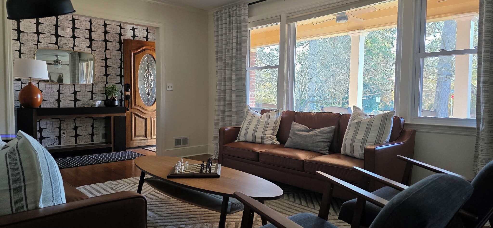 Smart TV, fireplace, books, computer monitors