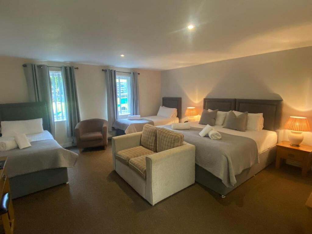 Quadruple Room | Iron/ironing board, free WiFi