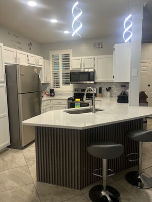Fridge, microwave, oven, stovetop - Apartment Near Disney with Free Shuttle ( scheduled) to Theme Parks, Free Parking, Free Wifi (Kissimmee)
