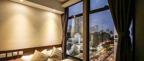 Deluxe Double Room, City View | Desk, blackout curtains, free WiFi, bed sheets