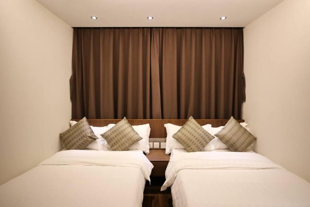 Classic Quadruple Room, City View | Desk, blackout drapes, free WiFi, bed sheets