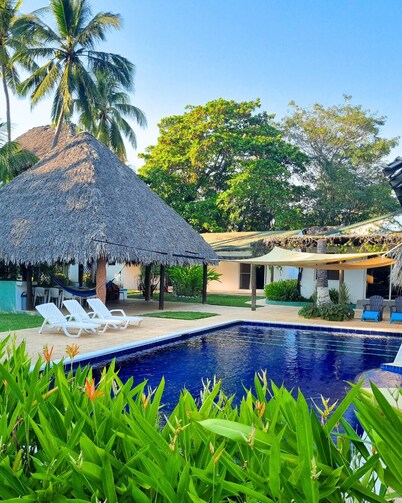 Spacious 8-bedroom, 22-guests chalet in tranquil Puerto San José with AC