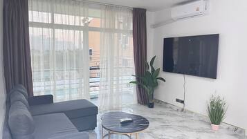 65-inch Smart TV with cable channels, Netflix, streaming services