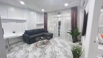 65-inch Smart TV with cable channels, Netflix, streaming services