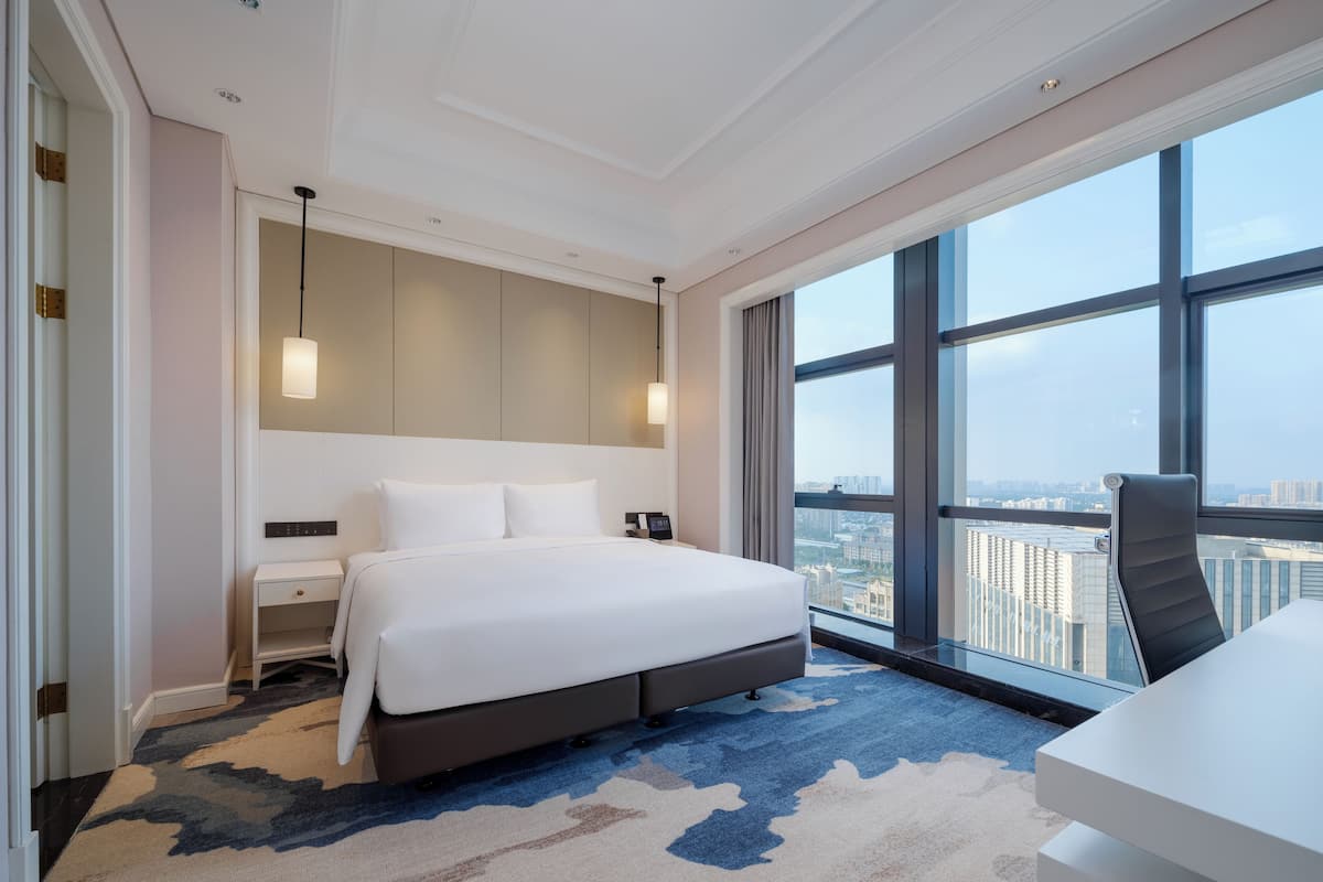 Suite Exclusive, 1 trÚs grand lit, niveau Exécutif