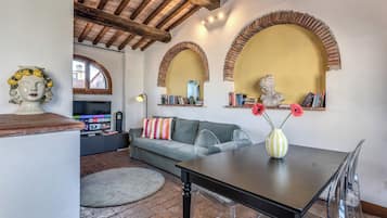Apartment, 3 Bedrooms, Garden View | Living area | Flat-screen TV