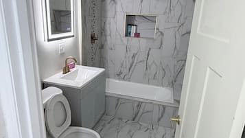 Hair dryer, towels, soap, toilet paper