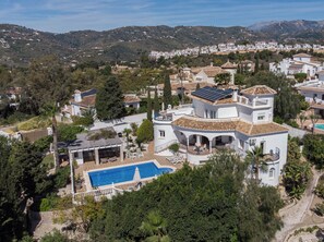 A large villa with a swimming pool, multiple balconies, and a view of the surrounding hills. - Villa Pomona - Five Bedroom Villa, Sleeps 10 (Frigiliana)