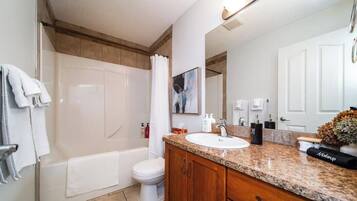 Hair dryer, towels, soap, shampoo