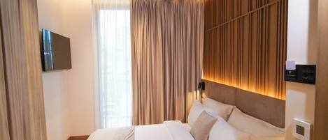 Dobbeltrom – standard, byutsikt | Minibar, wi-fi (inkludert) og sengetøy