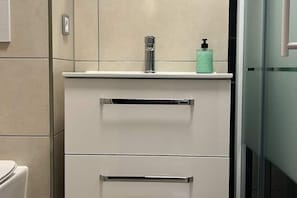 Ducha y secador de pelo