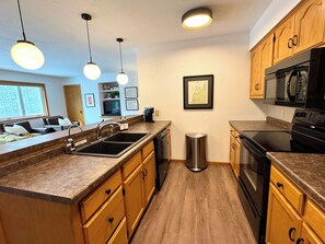 Fridge, microwave, oven, stovetop - Hilltop Haven for Two. 1-bedroom condo, walkable to Fish Creek + Pen State Park (Fish Creek)