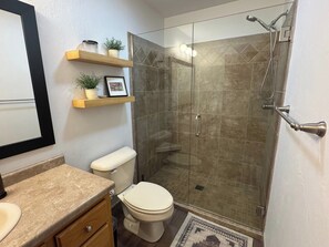 Shower, hair dryer, towels, soap