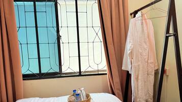 2 dormitorios, tabla de planchar con plancha, wifi y ropa de cama