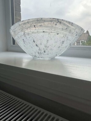 A clear glass bowl on a window sill. - Newly Redecorated 1 bed flat ! (Weston-Super-Mare)