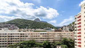 A multi-story building with a flat roof and numerous windows. - Incredible view of Cristo Redentor (Rio de Janeiro)