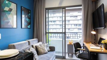 Apartment | Living area | 32-inch Smart TV with cable channels