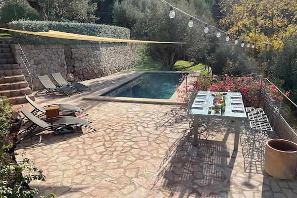 Private pool with large terraced area, sun loungers and casual eating