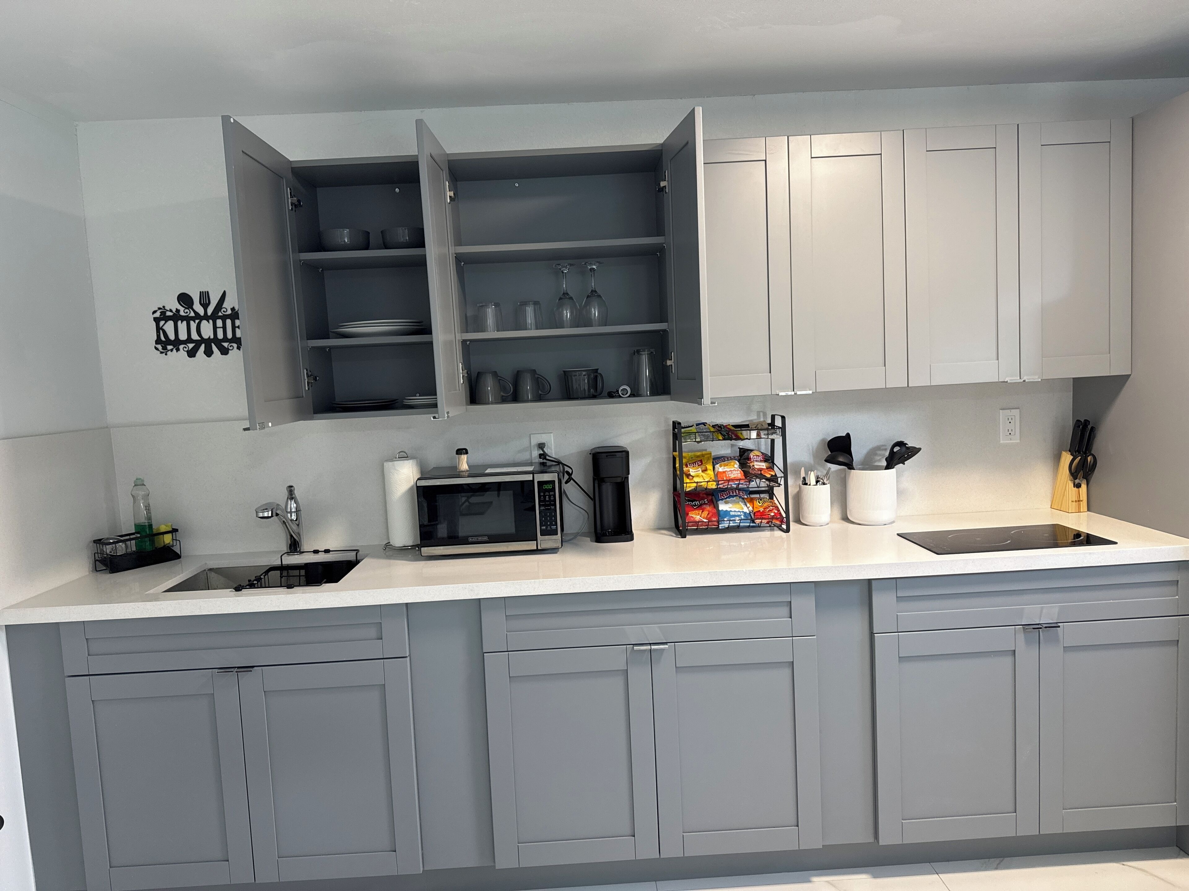 Fridge, microwave, stovetop, cookware/dishes/utensils