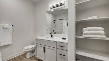 Hair dryer, towels, soap, shampoo