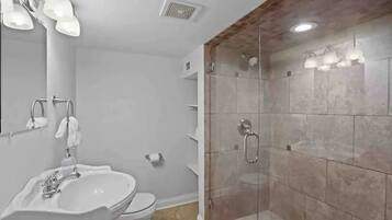 Jetted tub, hair dryer, towels, soap