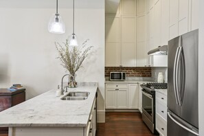 Private kitchen - Stayloom’s Retro Renovated CBD Place | near FQ (New Orleans)