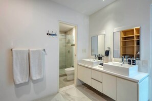 Shower, hair dryer - Modern condo near Medano beach (Cabo San Lucas)