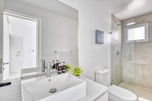 Shower, hair dryer - Modern condo near Medano beach (Cabo San Lucas)