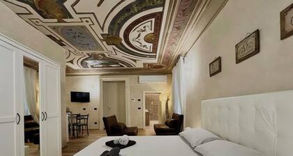 An ancient fresco above the gaze, the history around and the charm of Sarnico.