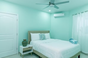 Iron/ironing board, Internet, bed sheets - Beach Vibe Villa-3 in Long Bay Hills (Long Bay Hills)