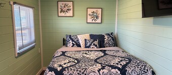 This unique tiny home has its own private pickleball court!