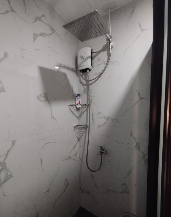 Shower, bidet, towels, soap