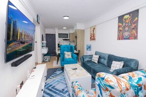 Apartamento, vista para a cidade | Área de estar