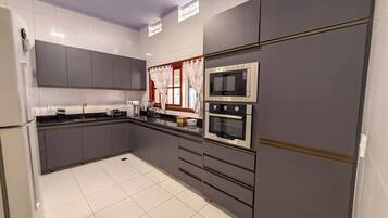 Casa conforto, 3 quartos | Cozinha privada