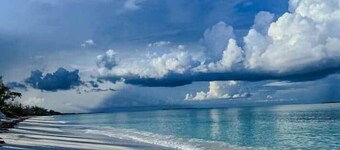 Driftwood Stacey 2 is beachfront with a vanishing edge pool and newly renovated
