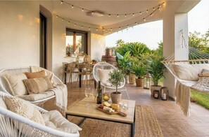 Outdoor dining - ClickSardena apartment Garden in Villa Fioretta with Pool and garden (Sardegna)