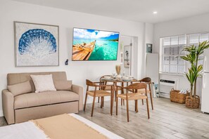 Iron/ironing board, travel crib, free WiFi, bed sheets