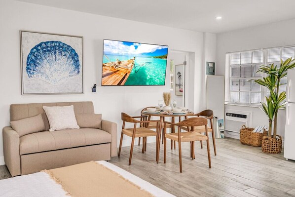 Iron/ironing board, travel crib, free WiFi, bed sheets