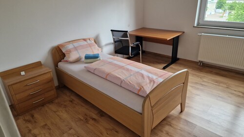 Room with shared bathroom